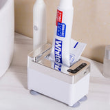 Touchless automatic toothpaste dispenser with a hand reaching towards the sensor to dispense toothpaste onto a toothbrush