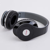 Wired sports headphones with ear hooks being worn by a person running