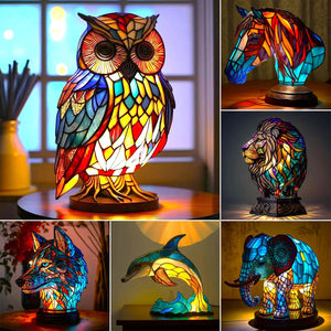 Collection of animal night lights with various figurine designs displayed on a shelf
