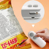 Mini handheld heat sealer with white and blue color options, featuring a cutting blade and USB charging port
